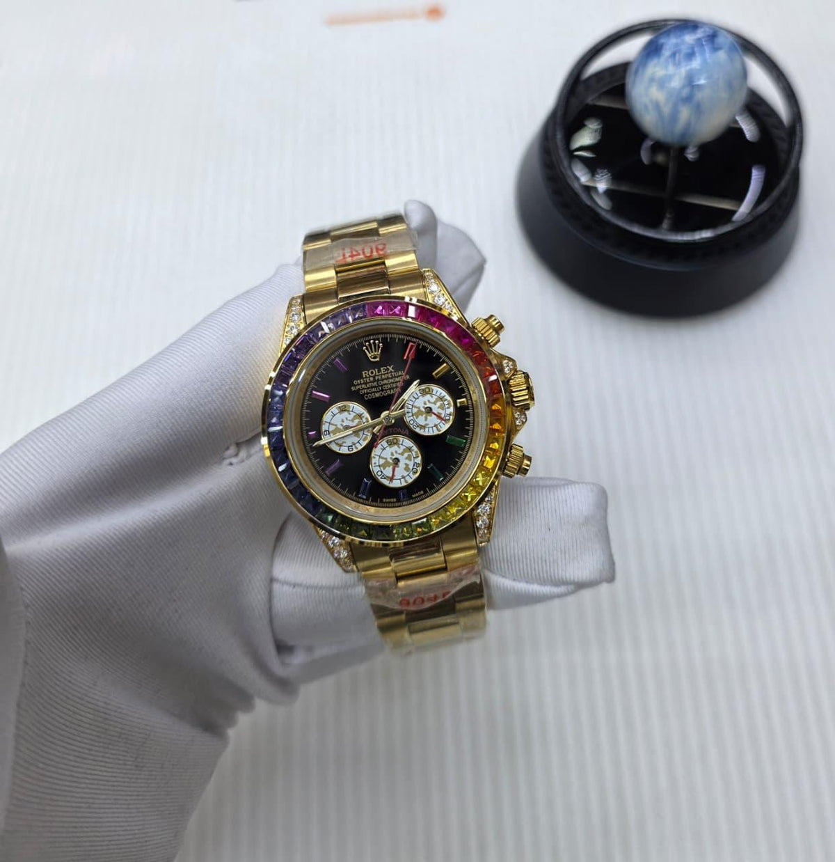 Rolex Cosmograph Daytona "Rainbow" with Sapphire Indices (Yellow Gold / Black Dial)